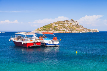 Obraz premium Pleasure boats moored in Agios Nikolaos