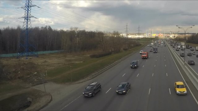 Highway Traffic and clouds in a Spring Day Timelapse