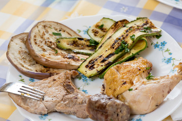 Cooked tasty mixed grilled meat