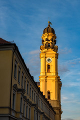 Fototapeta na wymiar The belfry of the Theatinerkiche in Munich