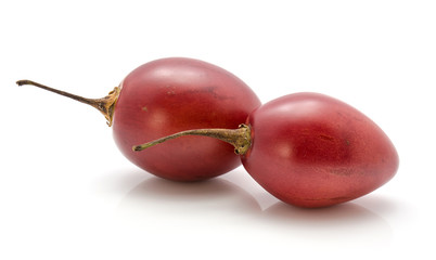 Pair tamarillo isolated on white background.