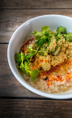 Chinese Congee with cilantro and chili oil