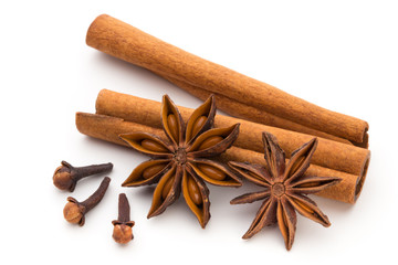 Cloves, anise and cinnamon isolated on white background.