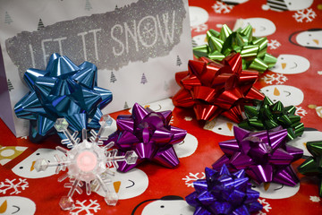 Christmas Wrapping Supplies with Bows, Bags, and wrapping Paper