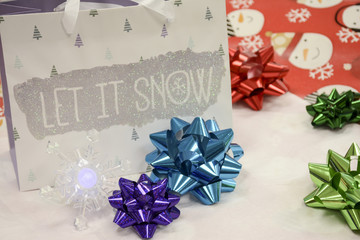 Christmas Wrapping Supplies with Bows, Bags, and wrapping Paper