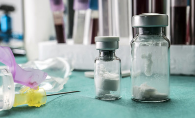  Several Vials And Syringe In Laboratory, Conceptual Image 