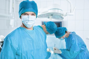 Close-up of a Nurse / Doctor Standing in an Operating Room