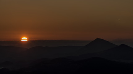 Sunset evening on Varhost hill in Ceske Stredohori mountains