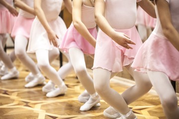 Fototapeta na wymiar Closeup of Young Ballet Dancers in a Ballet School