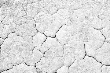 Black and white image of crack soil texture background