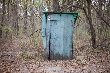 Old outhouse located in the woods