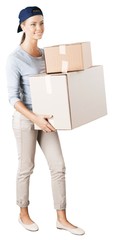 Woman moving into new house on background, holding boxes
