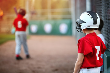 Youth Baseball player waiting on deck in batting line up
