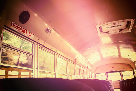 Interior of an old school bus, toned image