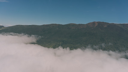 Misty Clouds Cover Maui, Hawaii's Mountains