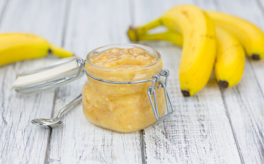 Banana Puree on wooden background © HandmadePictures