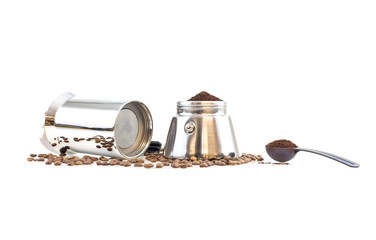 Coffee, stove top coffee maker, beens and a hot cup of coffee on isolated background