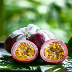 Passion fruit  in natural conditions on a beautiful tropical background.