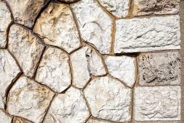 Old brown  wall with stone masonry, background, texture