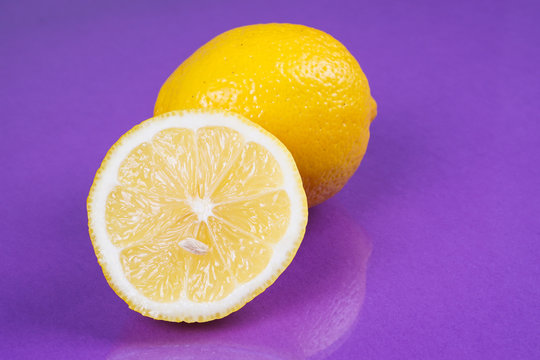 Lemon on purple background
