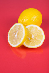 Fototapeta na wymiar Lemon on red background