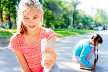 Kids drawing with chalk