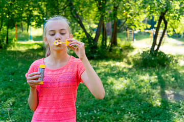 Fototapeta premium Kids with soap bubbles