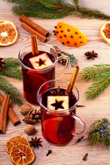 Mulled wine with spices and ingredients, vertical