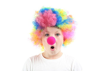 Portrait of little boy clown on white background