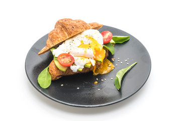 egg benedict with avocado, tomatoes and salad - healthy or vegan food style