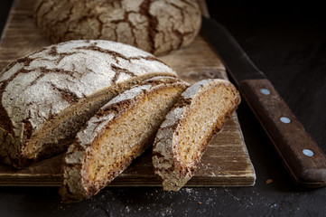 Rye bread on a black background.