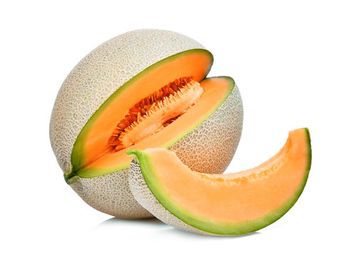 whole and slice of japanese melons, orange melon or cantaloupe melon with seeds isolated on white background