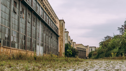 Fototapeta na wymiar Abandoned Factory Exterior Industry