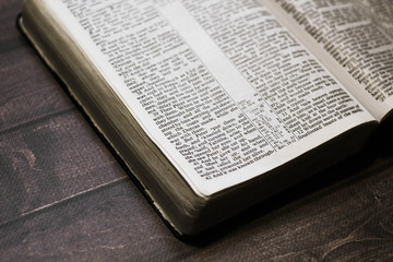 Bible with wooden background 