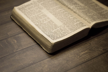 Bible with wooden background 