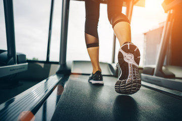 Asian woman exercising in the gym, Young woman workout in fitness for her healthy and office girl lifestyle.