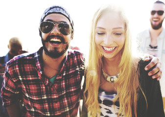 Couple and friends on the beach
