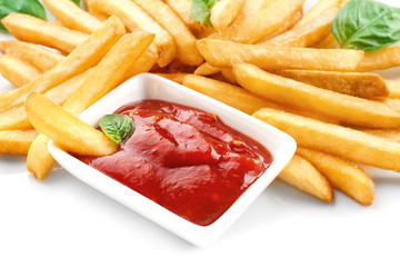 Yummy french fries and sauce on white background, closeup