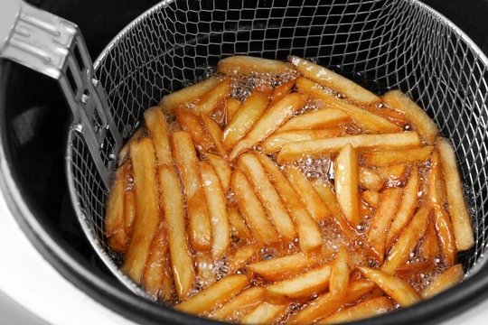 Cooking french fries in chip fryer
