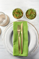 Top view of table setting for dinner in vegetarian cafe