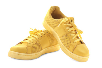 Pair of tennis shoes on white background