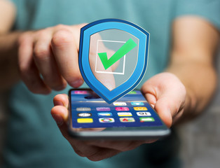 Shield symbol displayed on a futuristic interface - Security and internet concept