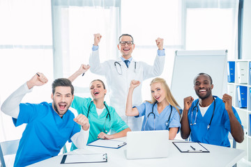 doctors celebrating victory