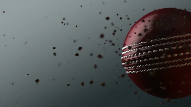 A dirty red cricket ball caught spinning in slow motion flying through the air scattering dirt particles in its wake - 3D render