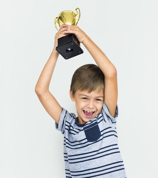 Little Boy Kid Adorable Cute Winning Trophy Portrait Concept