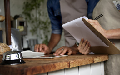 Closeup of hands holding stock checking list paper