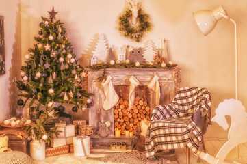 Christmas shining tree with decorations, tinsel, star, balls. Interior in vintage style. New year holidays.
