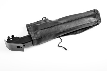 Black car jack isolated over white background.