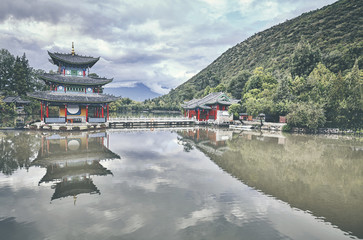 Jade Spring Park in Lijiang, retro color toned picture, China.