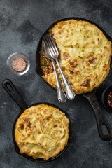 shepherd's pie. Minced meat, mashed potatoes and vegetables casserole in cast iron pan